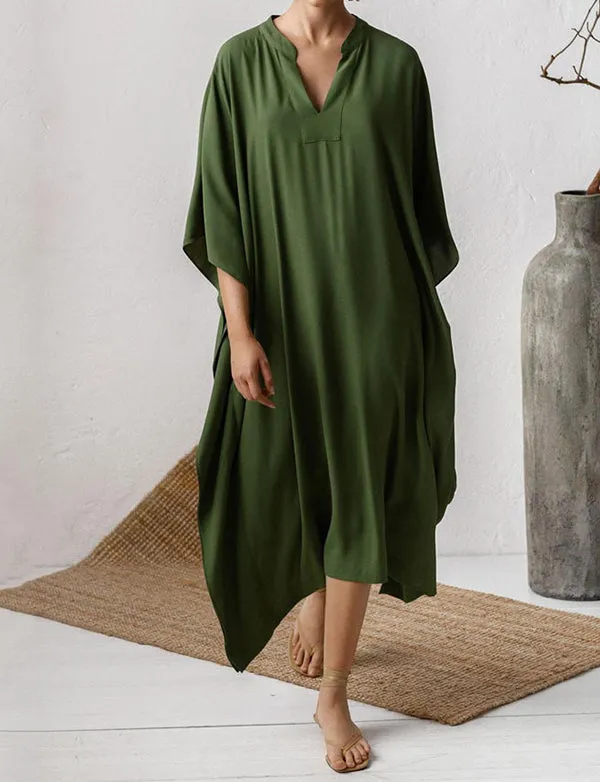 Robe de plage sexy à col en V profond et couleur unie