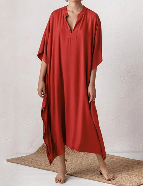 Robe de plage sexy à col en V profond et couleur unie
